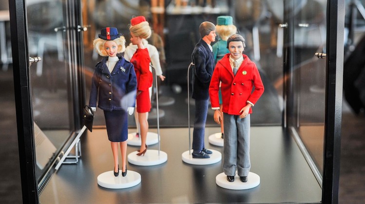 The Qantas Club in Sydney will feature Ken and Barbie modelling the airline's uniforms through the ages. (Qantas)