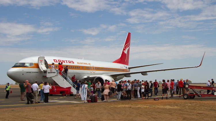 People milling around the Qantas retrojet at Longreach Airport. (Dave Parer)