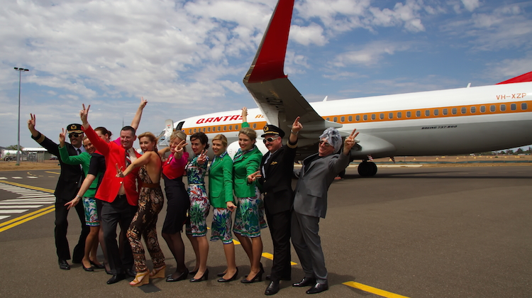 Qantas staff get into the spirit of things at the airline's charity flight to Longreach. (Dave Parer)