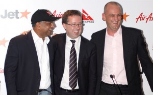 Brothers in arms? Tony Fernandes, Alan Joyce and Bruce Buchanan share a laugh at the January 6 launch of the Jetstar-AirAsia alliance. (Andrew McLaughlin)