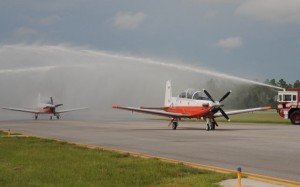 US Navy T-6Bs arrive at Whiting Field, Florida, last year. (USN)