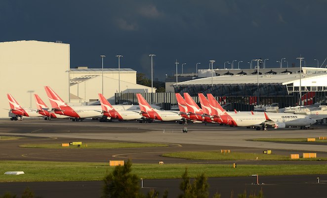 Grounded Qantas aircraft at the airline's Sydney domestic terminal on October 30. (Damien Aiello)