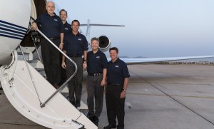 The Gulfstream flight crew for the G650's  around-the-world record.  From left: Tom Horne, Bud Ball, Eric Parker,  Ross Oetjen and John McGrath.