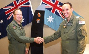 Director of the C-27J Transition Team GPCAPT Steve Young (l) takes command of 35SQN from OC 84WG GPCAPT Jim Ghee (r) on January 21. (Defence)