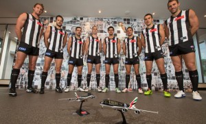 The Collingwood leadership team poses with Emirates A380 models. (Emirates)