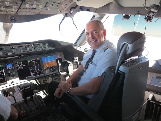 Capt Dave Morgan on the flightdeck of ZK-NZE.
