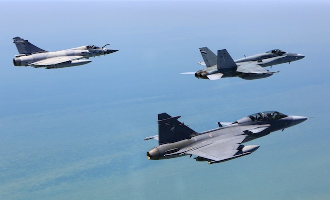 RAAF Hornet leads a UAE Mirage and Thai Gripen.