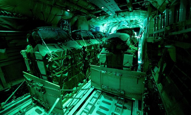 Fifteen airdrop pallets lashed to the floor of the RAAF C-130J. (Defence) 