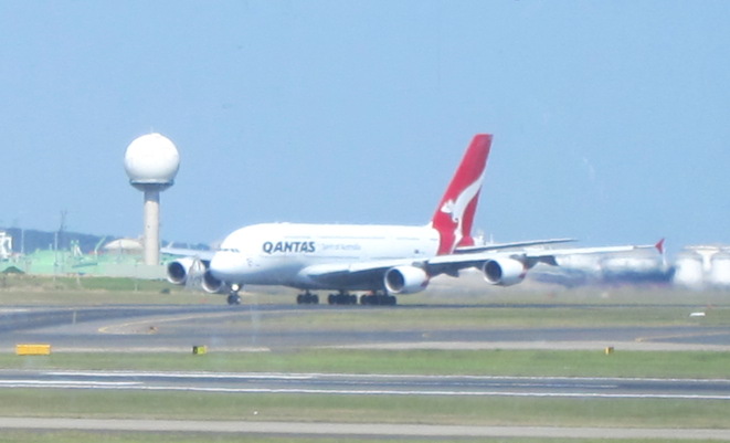 QF7, registration VH-OQL, takes off from Sydney from Dallas/Fort Worth.