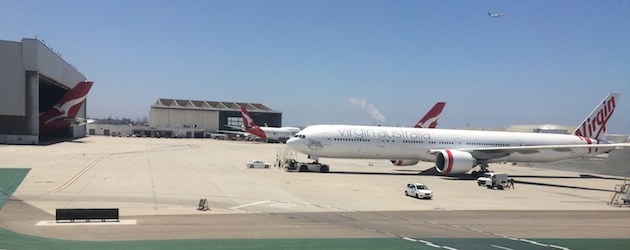 Qantas (and Virgin) aircraft in and outside the existing Qantas LAX hangar.