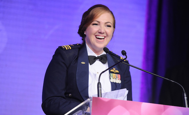 RAAF Squadron Leader Samantha Freebairn receives her 2014 Queensland business innovation award. (Telstra)