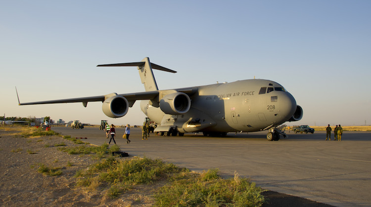 A Royal Australian Air Force C-17 Globemaster aircraft unloads its cargo of ammunition at Erbil International Airport, Iraq. (Defence)