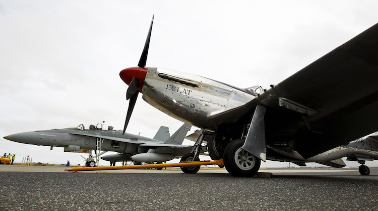 An F/A-18 Hornet is parked alongside a P-51 Mustang at Avalon Airport. (Defence)