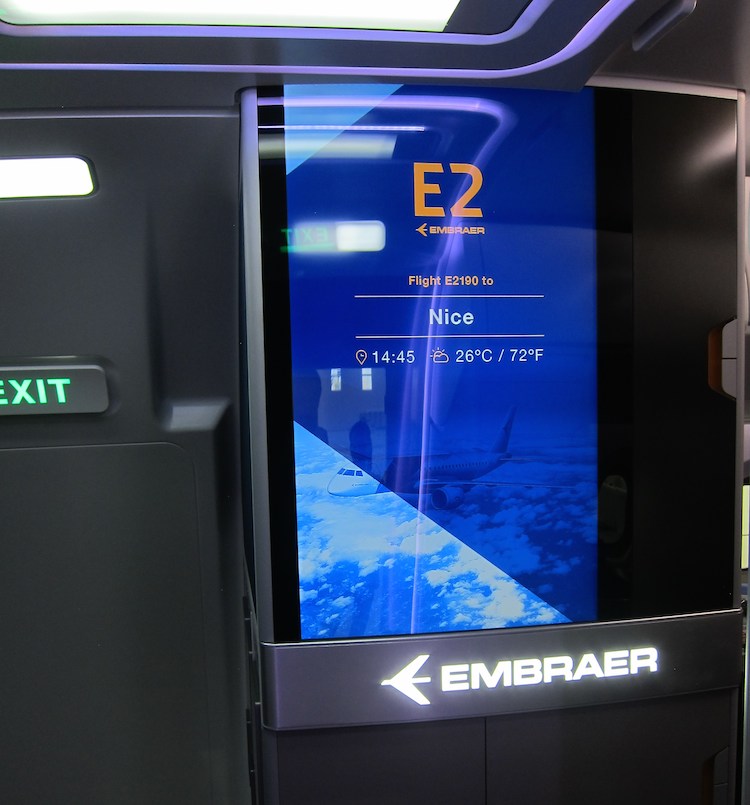 The interiors of the E2 jet feature a welcome screen that can display weather information, flight details or advertising. (Jordan Chong)
