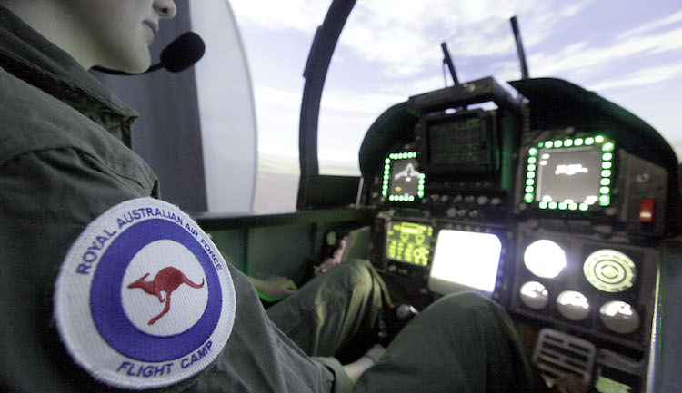 A participant at Air Force Flight Camp at RAAF Base East Sale in a F/A-18 Hornet simulator. (Defence)