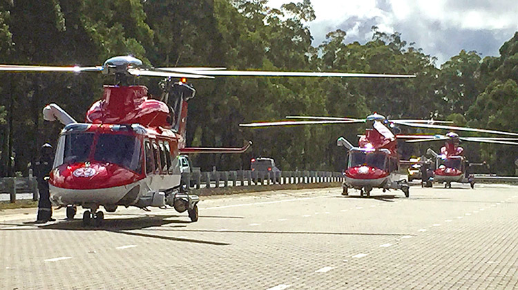 Three NSW Ambulance helicopters attend an accident on Sydney's south coast. (Phil Irwin)