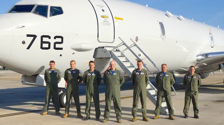RAAF P-8A Poseidon aircrew in front of the aircraft at Naval Air Station Jacksonville, Florida. (Defence)