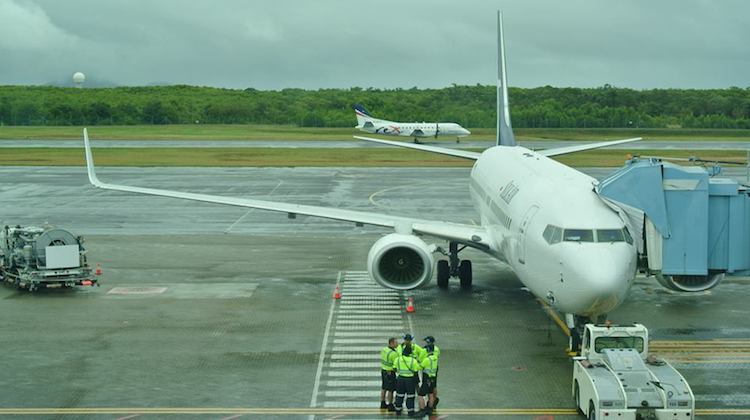 Silkair's inaugural flight to Cairns sits at the departure gate. (Cairns Airport/Facebook)