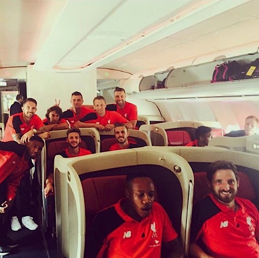 Members of the Liverpool squad on board the A340-500. (LFCPhoto/Twitter)