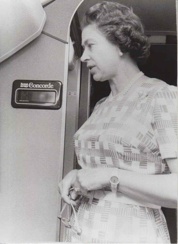The Queen at the Machmeter during her flight on Concorde from Barbados to London, November 1977. (British Airways)