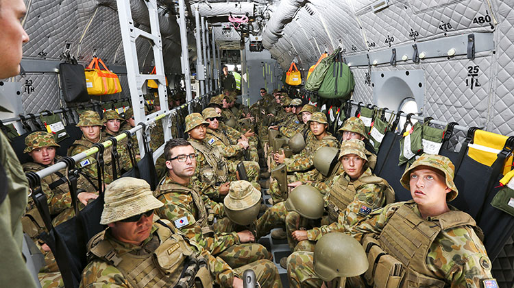 Royal Australian Air Force and Australian Army personnel conduct load transfer trials between a C-27J Spartan battlefield airlifter aircraft and an Australian Army CH-47 Chinook helicopter at RAAF Base Townsville, Queensland, on 12 November 2015.