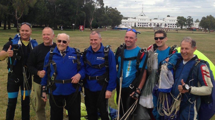 Peter Lloyd, third from left after his tandem skydive over Canberra in December 2015. (Safeskies)