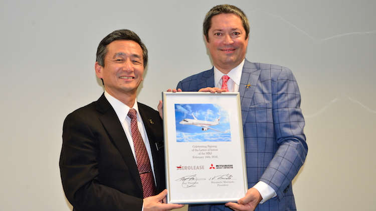Mitsubishi Aircraft Corporation chairman Hiromichi Morimoto and Aerolease Aviation partner Jep Thornton with the letter of intent for 10 MRJ aircraft. (Mitsubishi Aircraft Corp) 