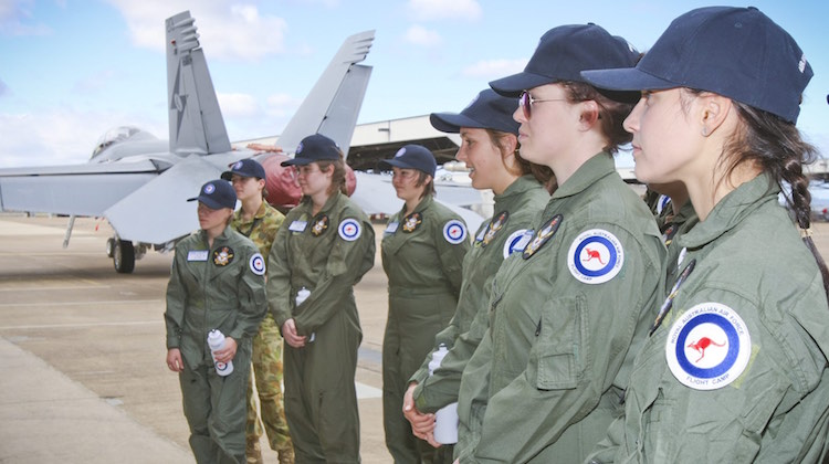 Girls attending the Air Force Flight Camp on the flightline at No. 6 Squadron, the home of F/A-18F Super Hornets.