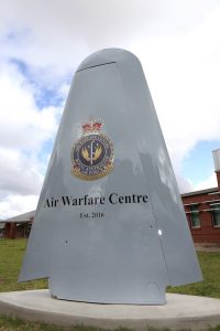 The newly unveiled ‘Air Warfare Centre' (AWC) sign outside the AWC Headquarters at RAAF Base Edinburgh.