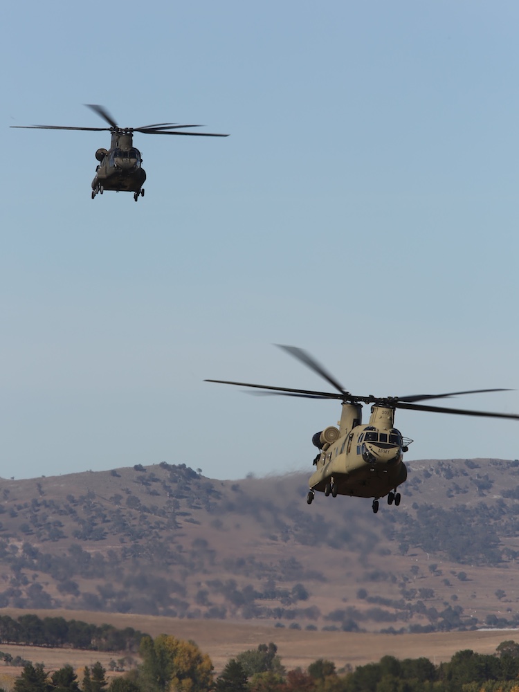 Army CH-47D Chinook, A15-202 and CH-47F, A15-303, on approach to Air Force's 34SQN, Fairbairn. (Paul Sadler)