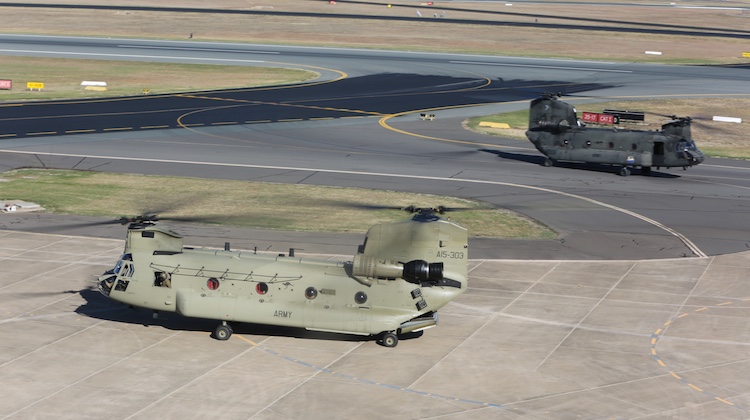 Army CH-47D Chinook, A15-202 and CH-47F, A15-303, approaching Fairbairn. (Paul Sadler)