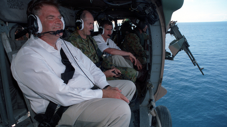 A file image of Kim Beazley taken during the Interfet operation in East Timor in 1999 flying back to Dili after visiting HMAS Sydney. (Defence)