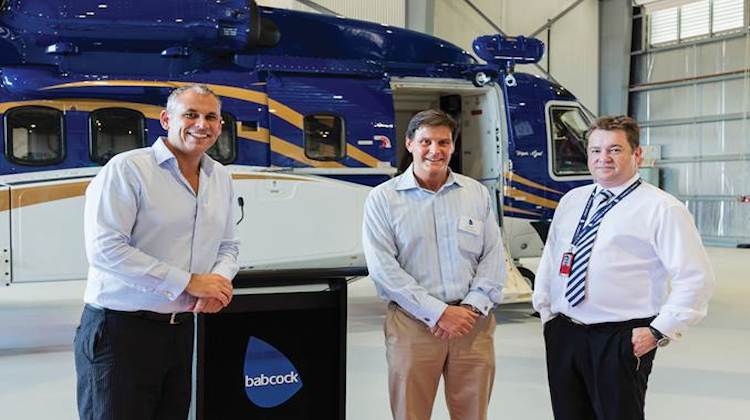 From left, NT Chief Minister Chief Minister Adam Giles, Darwin Airport's director property Ross Baynes and (Director Property, ) and Babcock Babcock Mission Critical Services and Offshore Services Australasia managing director John Boag. (NT Airports)