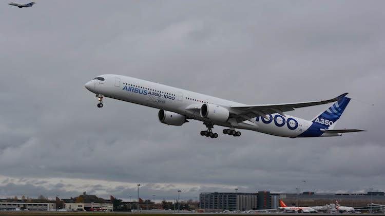 Airbus A350-1000 MSN059, with a chase plane alongside, takes off on its first test flight. (Airbus)