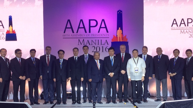 Airline executives pose for obligatory group shot at opening of Association of Asia Pacific Airlines annual gathering in Manila. (Jordan Chong) 