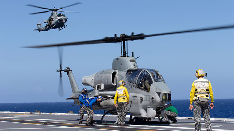Four UH-1Y Venoms (airborne) and five AH-1W Super Cobras are headed for Darwin in April. (Defence)