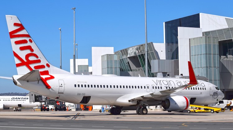 One of Virgin Australia's Boeing 737-800s with inflight internet Wi-Fi, VH-YIG, at Canberra Airport. Note the antenna fairing on the upper fuselage. (Canberra Airport)