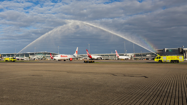 Airservices Aviation Rescue and Firefighting monitor cross greet Malindo Air at Brisbane. (Lance Broad)