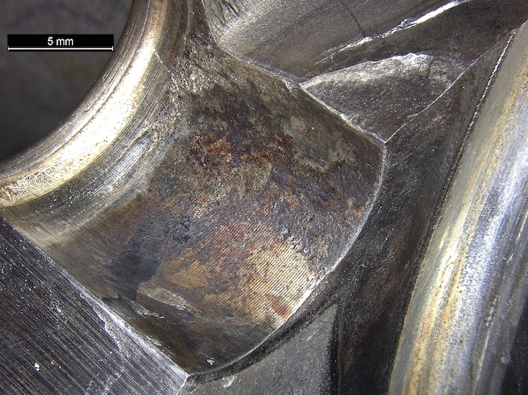 Corrosion observed within the bore of the dowel pin hole. (ATSB)