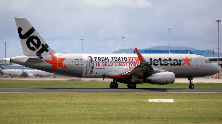 Jetstar Airbus A320 VH-VFU featuring a Uniqlo promotion. (Andrew Belczacki)