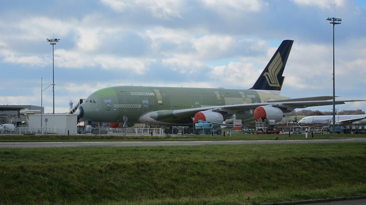An unpainted Singapore Airlines Airbus A380, MSN 255, sits at Airbus's facility in Toulouse. (Jordan Chong)