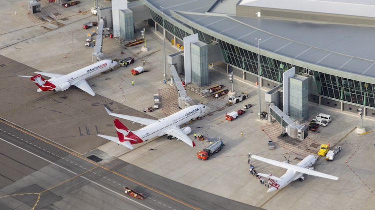 Qantas and Virgin Australia aircraft at Canberra Airport. (Seth Jaworski)