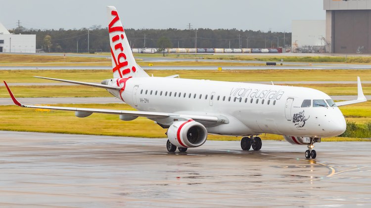 E190 VH-ZPH taxis at Brisbane after operating the type’s last revenue flight with Virgin Australia. (James Baxter)