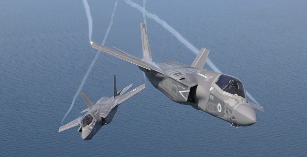 A USAF F-35A and RAF F-35B break for the camera during a recent visit to the UK for the RIAT and Farnborough airshows. (Lockheed Martin)