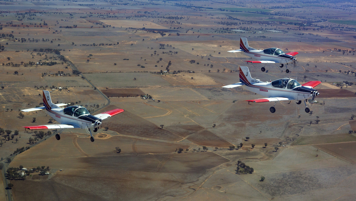 Basic Flying Training School CT-4 aircraft participate in a formation flypast over Tamworth, New South Wales. (Defence)