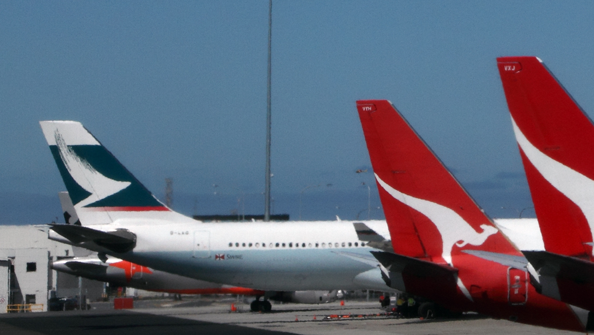 A file image of Cathay Pacific and Qantas aircraft at Adelaide Airport. (Rob Finlayson)