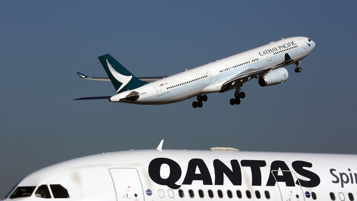 A file image of Cathay Pacific and Qantas aircraft at Sydney Airport. (Rob Finlayson)