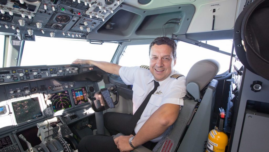 Alex Passerini on the flightdeck of a Qantas Boeing 737. (Qantas)