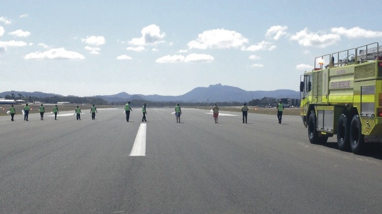 A file image of a foreign object debris (FOD) walk. (Australian Airports Association)