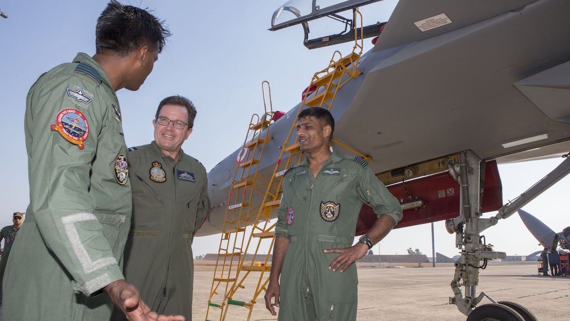 Officer Conducting Exercise, Air Commodore Mike Kitcher, AM, DSM is shown over an Indian Air Force SU-30MKI by Group Captain Prem Anand and Group Captain CUV Rao during Exercise Pitch Black 18. (Defence)
